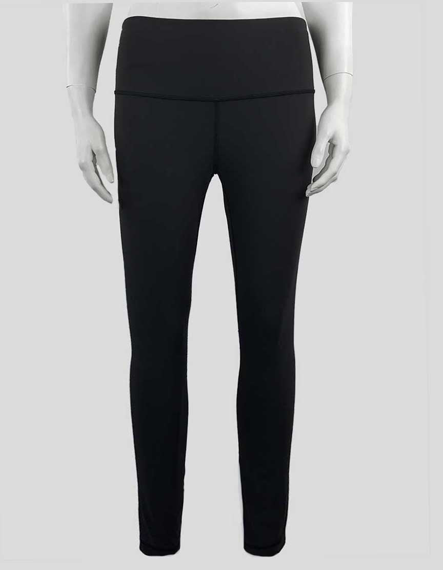 Lululemon Women's Medium Waisted Leggings In Dark Grey With Tonal Stitching Throughout Size 8 US