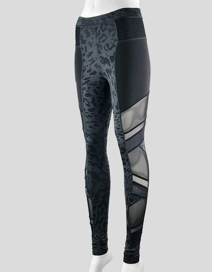 Lululemon Women's High Rise Grey Leggings With Black Animal Print Throughout In A Light Weight Sweat Wicking Nylon Fabric Size 2 US