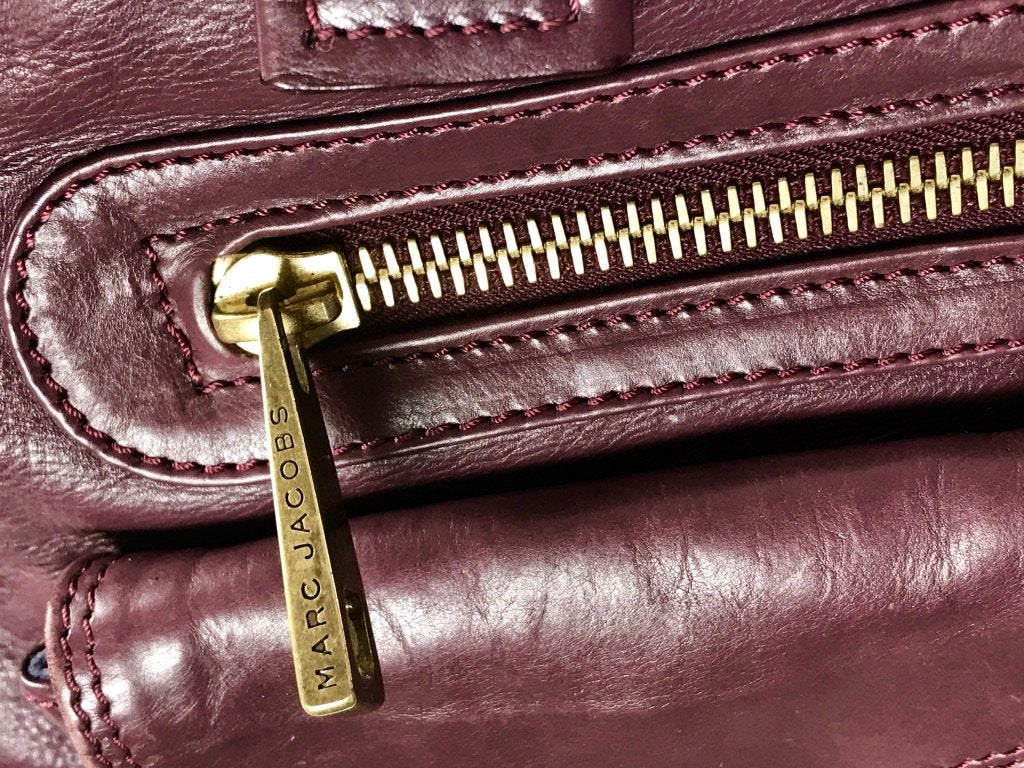 Marc Jacobs Stella Tote Bag With Front Buckle And Zipper Pockets In Burgundy Leather With Bronze Tone Hardware